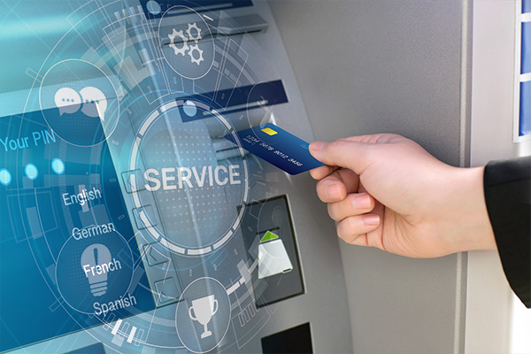 NCR ITM service transparent graphic over hand holding debit card inserting it into an ITM