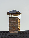 Chimney cap in place - Monmouth County chimney service checks this and many other chimney parts to ensure they are not damaged